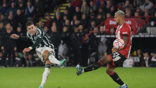 Diogo Dalot pictured (left) scoring for Manchester United against Sheffield United in October 2023